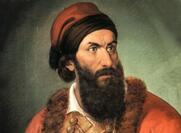 Ο Παπαφλέσας ανακοινώνει στη Διάσκεψη της Βοστίτσας (Αίγιο) ότι η επανάσταση εναντίον των Οθωμανών έχει οριστεί για τις 25 Μαρτίου